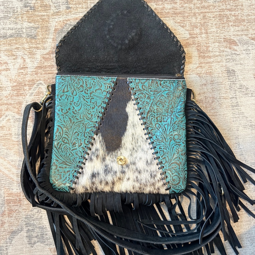 Turquoise Accent Cowhide Tooled Fringe Crossbody Bag - Picture 4 of 9